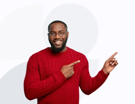 Smiling ICT professional pointing to Eujim Solutions quality digital services